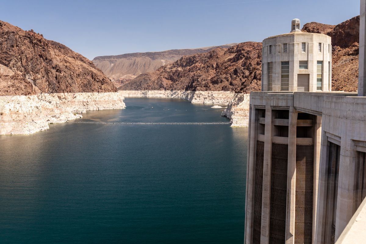 Lighter rock shows the pervious water level of Lake Mead near the intake towers of Hoover Dam