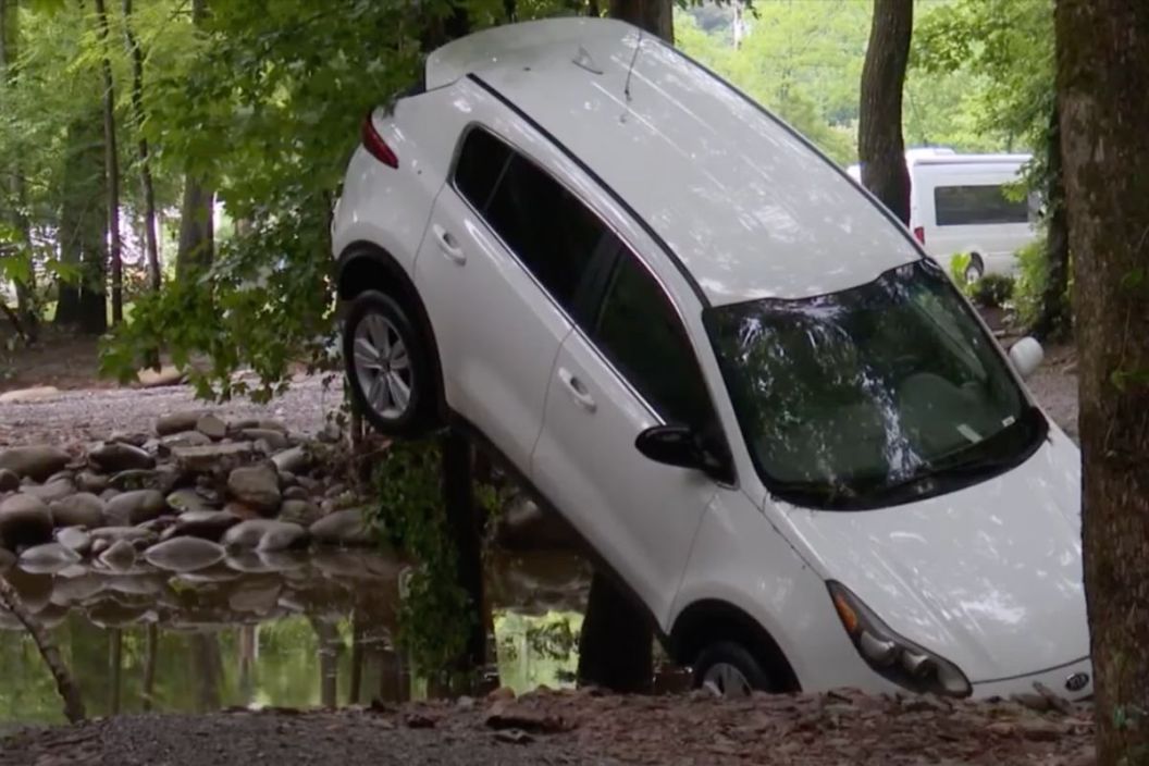 Floods wash SUV into tree in Great Smoky Mountains National Park