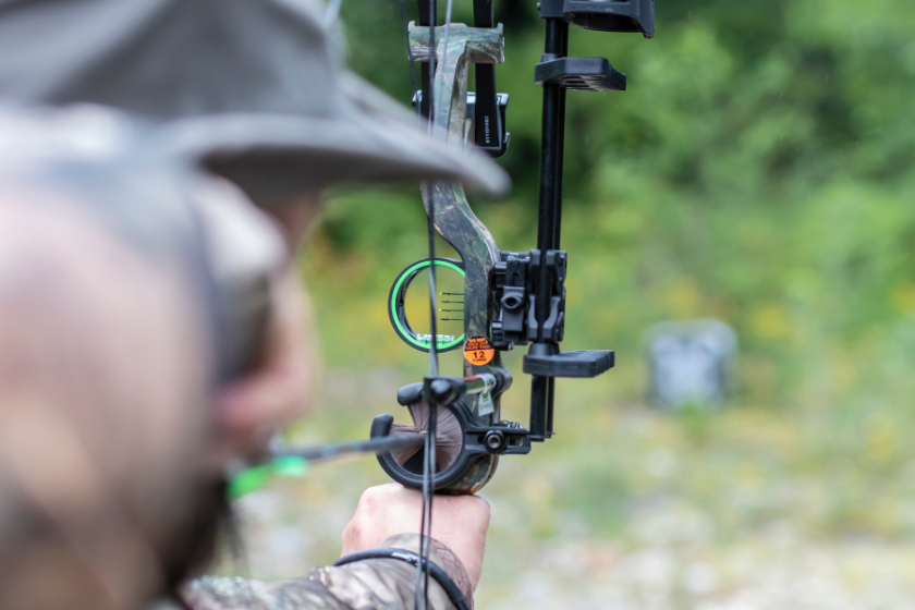 Someone Holding a Compound Hunting Bow