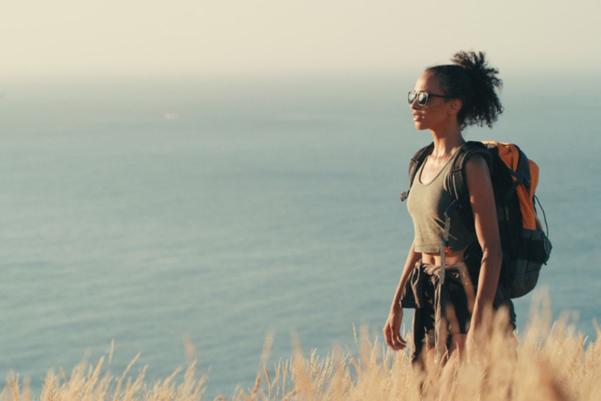 woman wearing sunglasses on hike