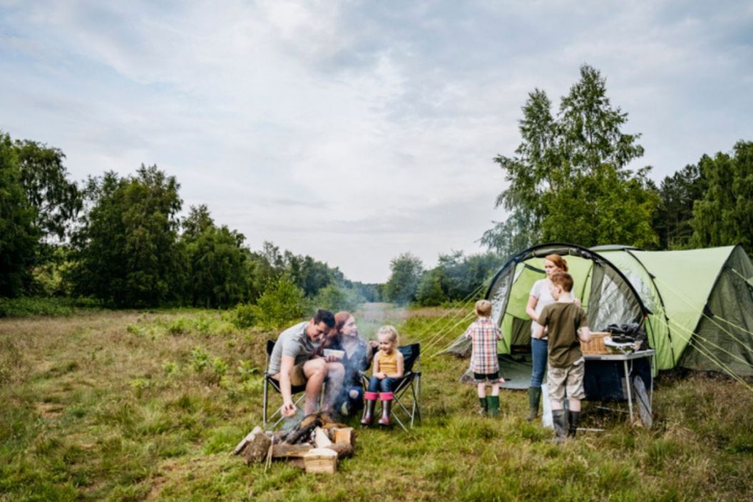 family camping together in remote area