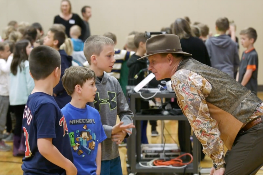 screenshot of a video of kevin lovegreen, author, talking to elementary school kids