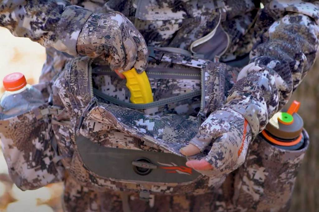 Close up of the SItkA Tool Belt worn by a hunter in the woods