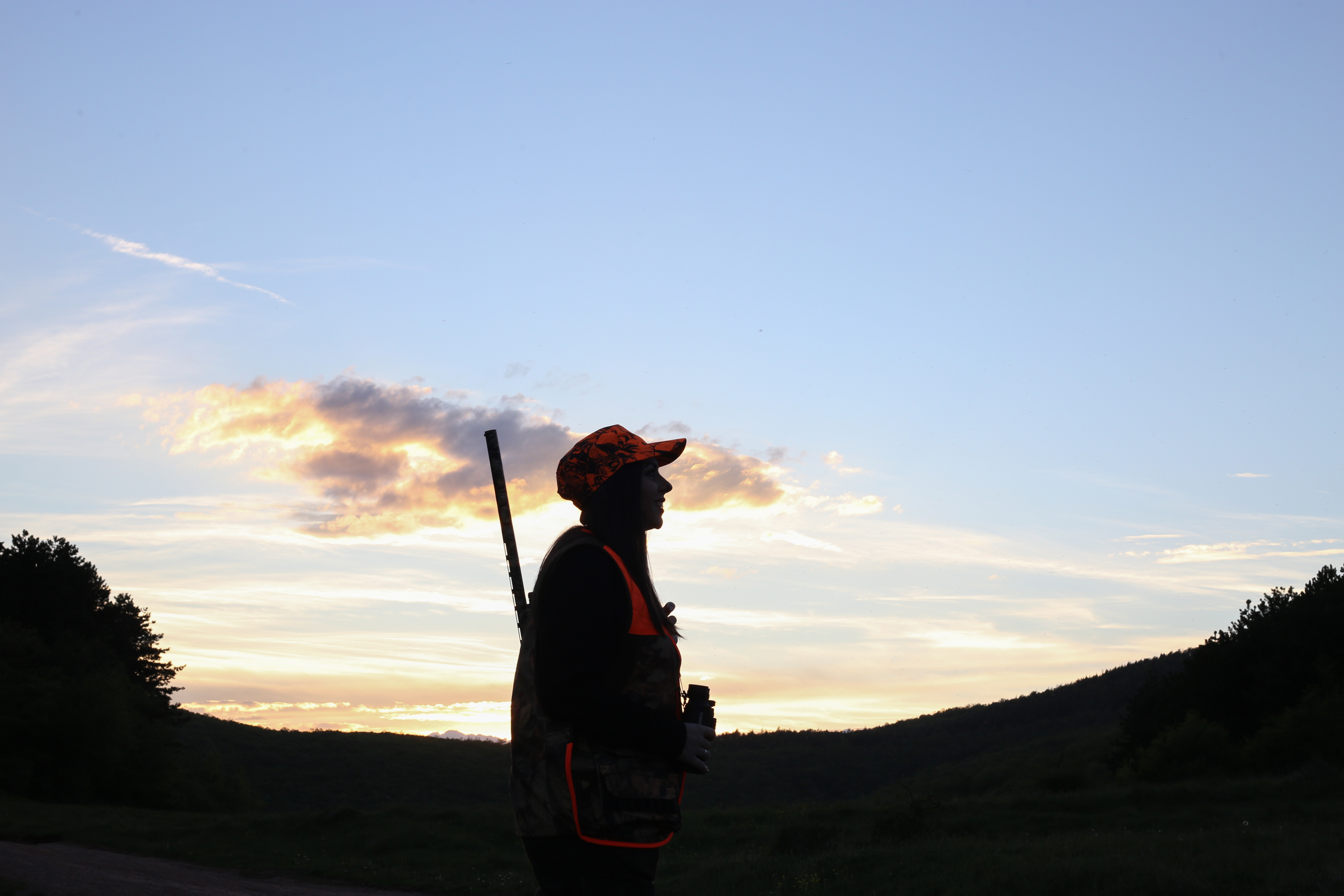 Woman hunter, looking for birds