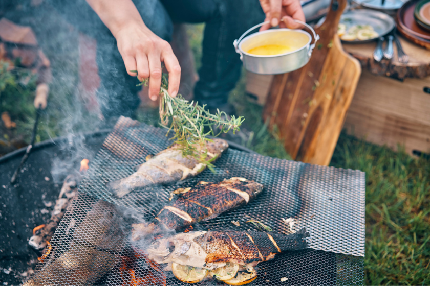 cooking fish outdoors