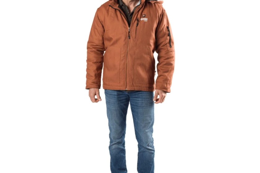 Person wearing an orange-brown work jacket