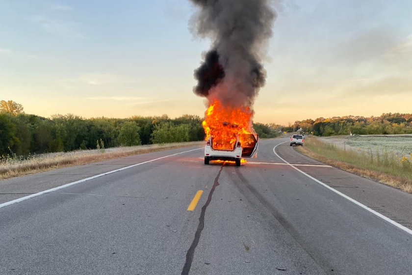 car on fire in middle of highway