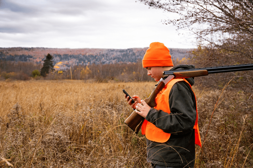 young hunter on phone