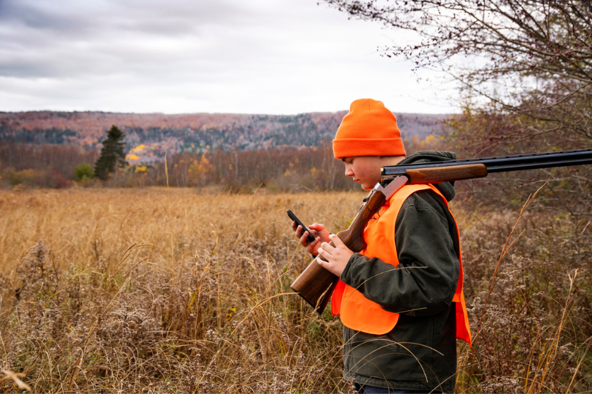 young hunter on phone