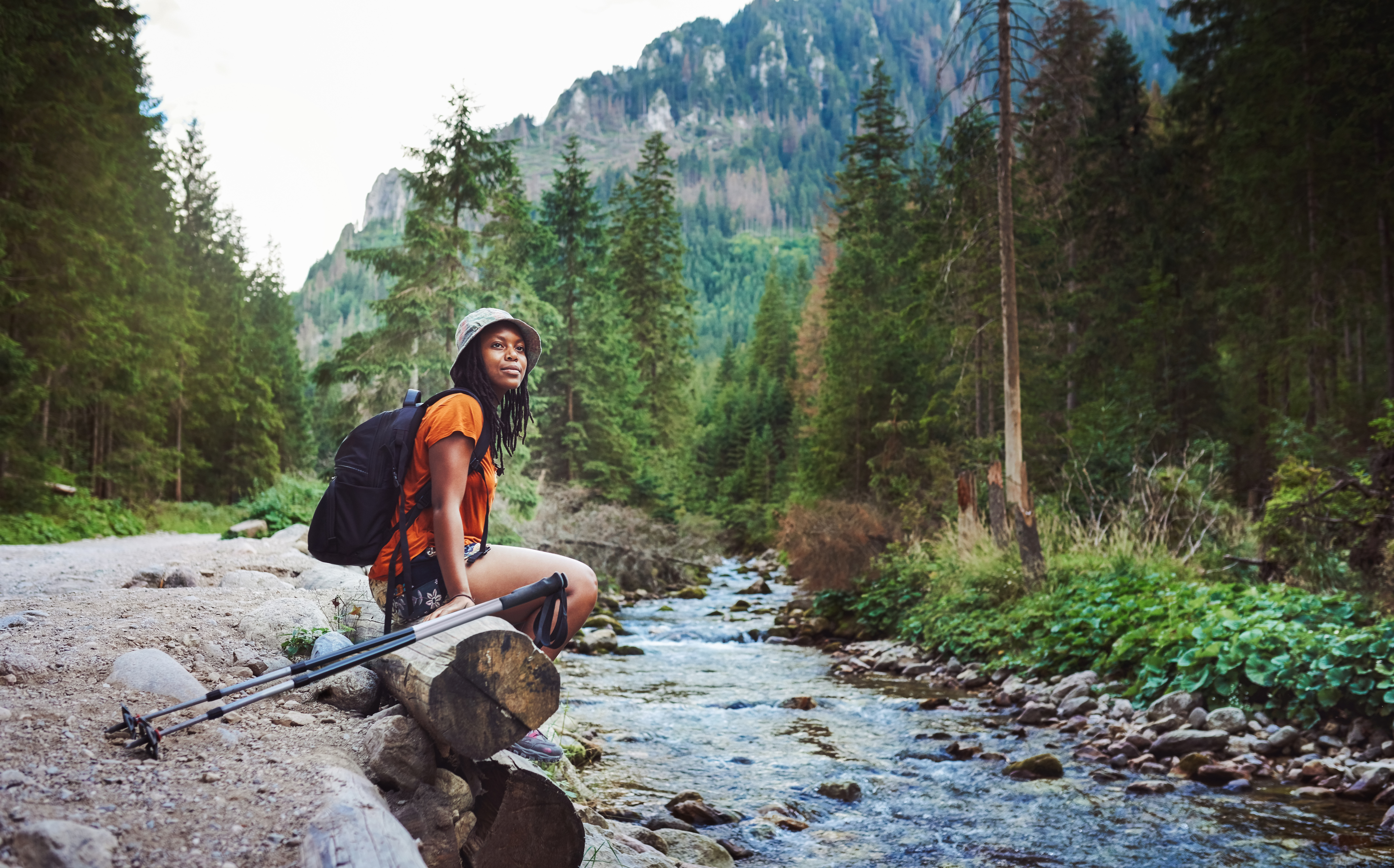 Shot of a young attractive woman hiking in nature