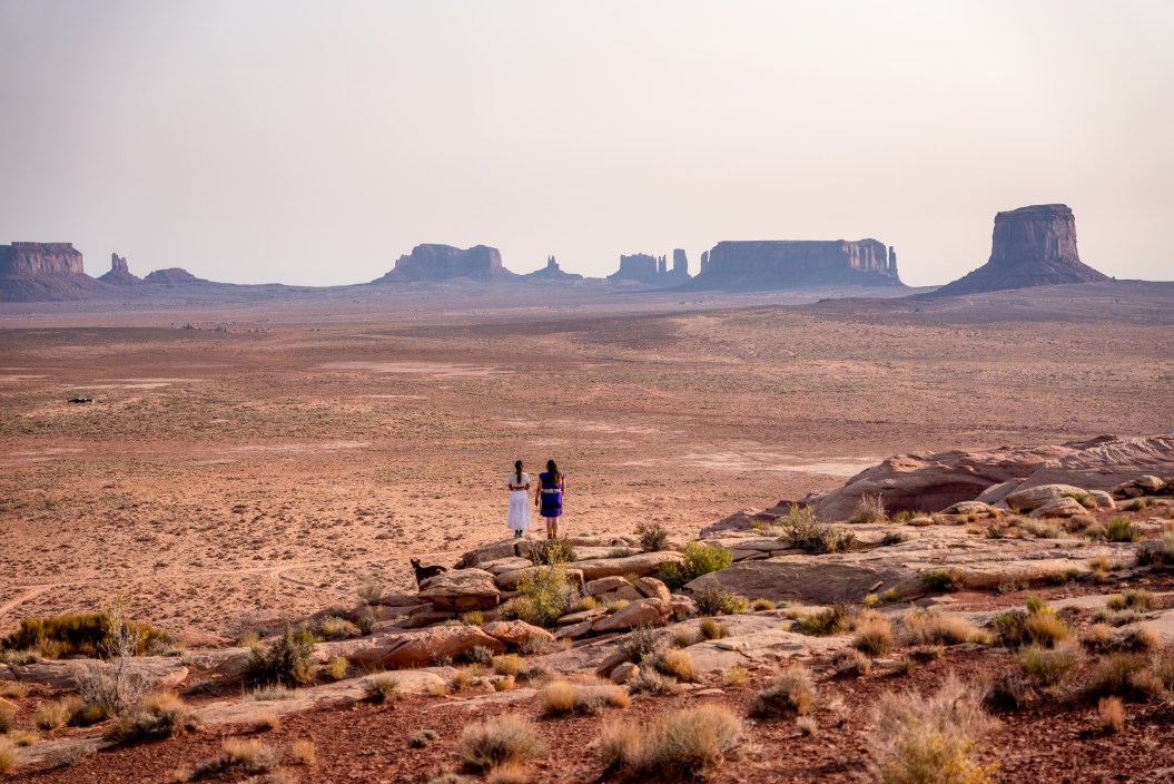Two Teenage Navajo Native American Girls Looking over the Vast Desert in Northern Arizona Monument Valley Tribal Park Navajo Reservation