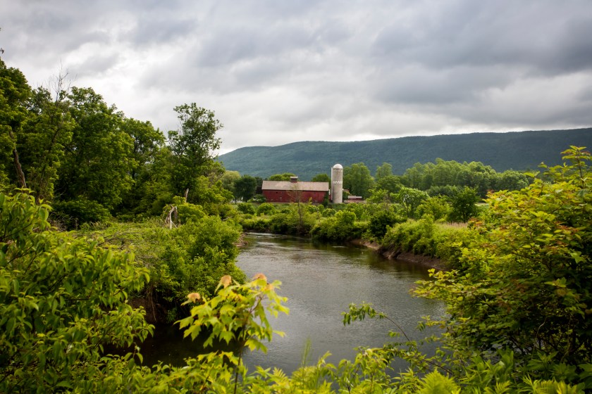 An idyllic farm serves as the background for a picture of the Battenkill River in southern Vermont. 