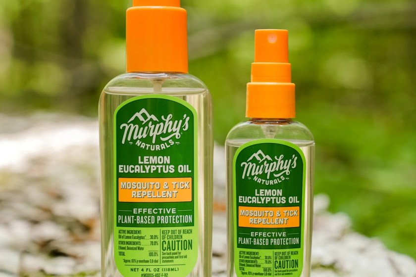 Two bottles of Murphy's Naturals Insect Repellent Spray on a campground