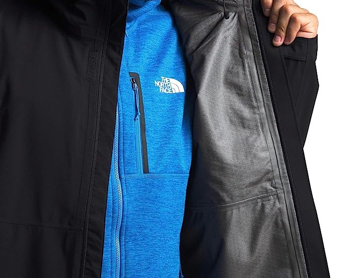 Person wearing the Men's Dryzzle FUTURELIGHT™ Jacket