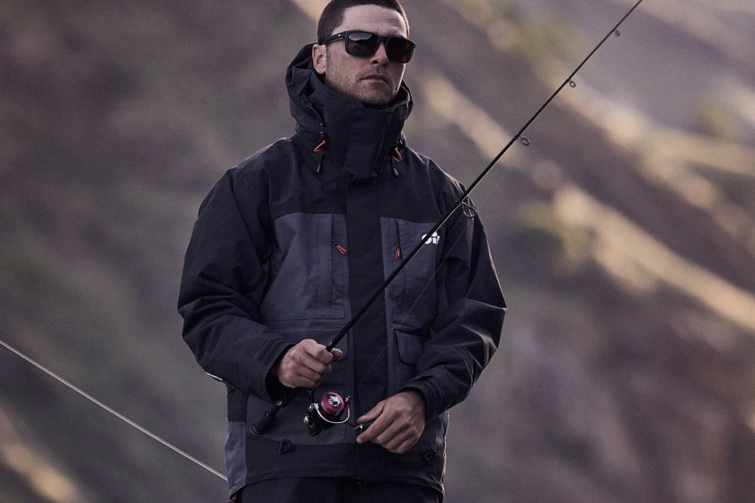Person wearing the Gill Fishing Tournament Jacket while fishing 