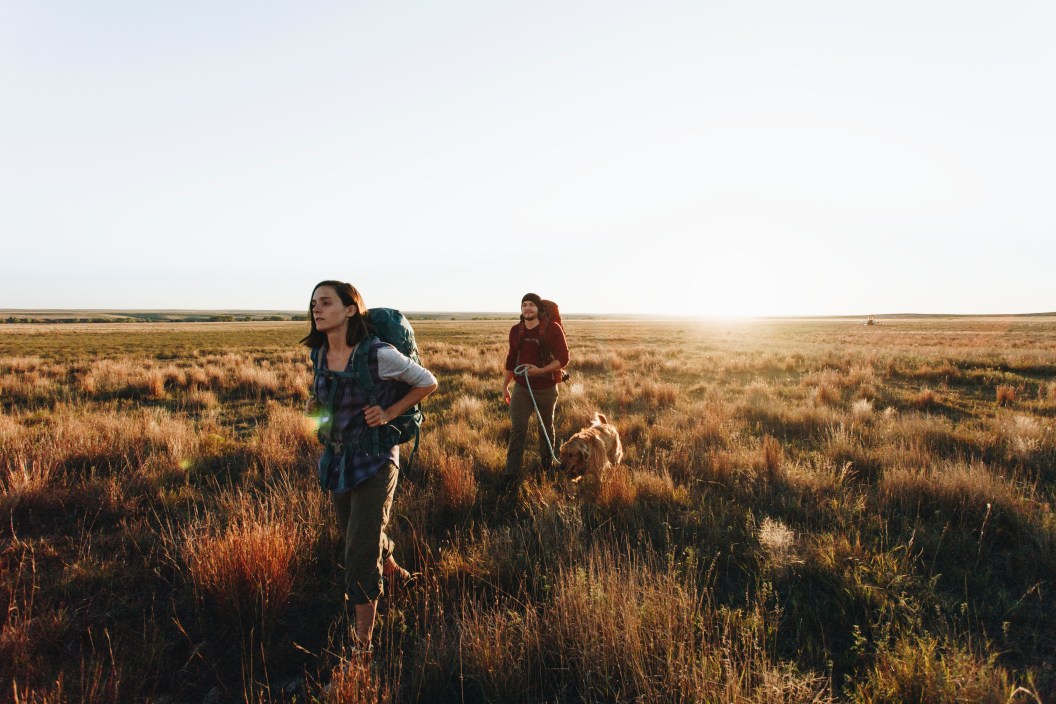 Couple hiking together in the wilderness