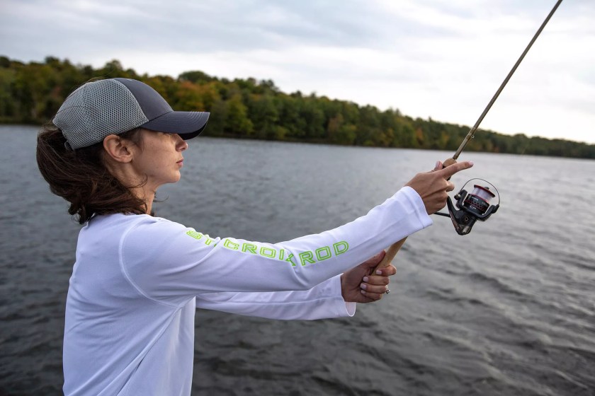 Person in a white long sleeves tshirt casting a St. Croix Panfish Series rod