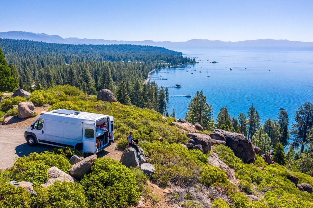 A Young Couple Parked Van at a Viewpoint of Lake Tahoe