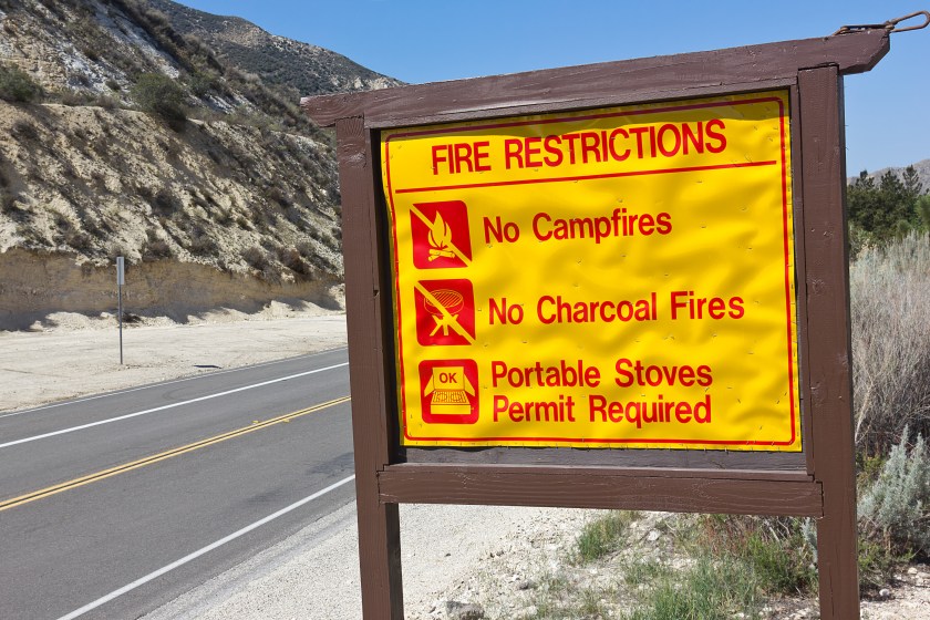 Sign posting on fire restrictions in a rural area.