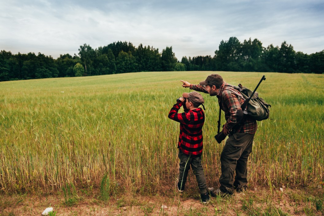 father and kid hunting