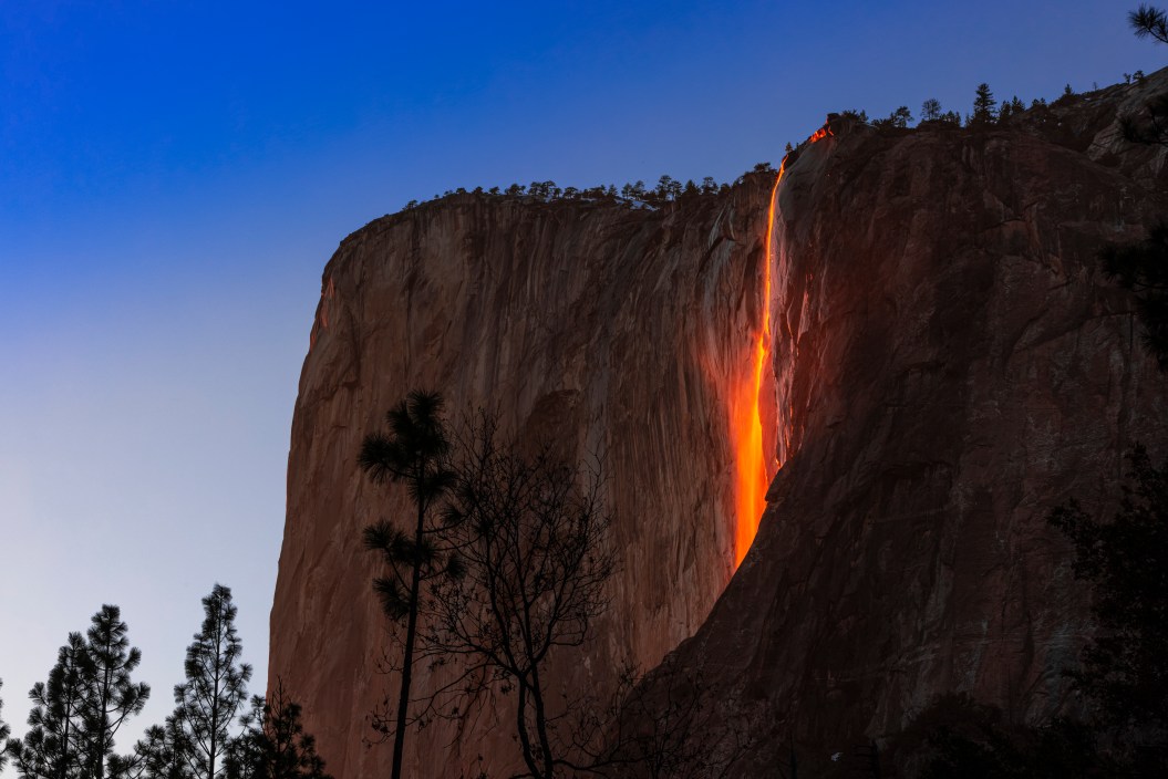 The horsetail waterfall in Yosemite National Park in California as the Fire Fall during winter. The natural Firefall is one of Yosemite National Park’s most amazing spectacles. Around the second week of February, the setting sun hits Horsetail Fall at just the right angle to illuminate the upper reaches of the waterfall. And when conditions are perfect, Horsetail Fall glows orange and red at sunset.