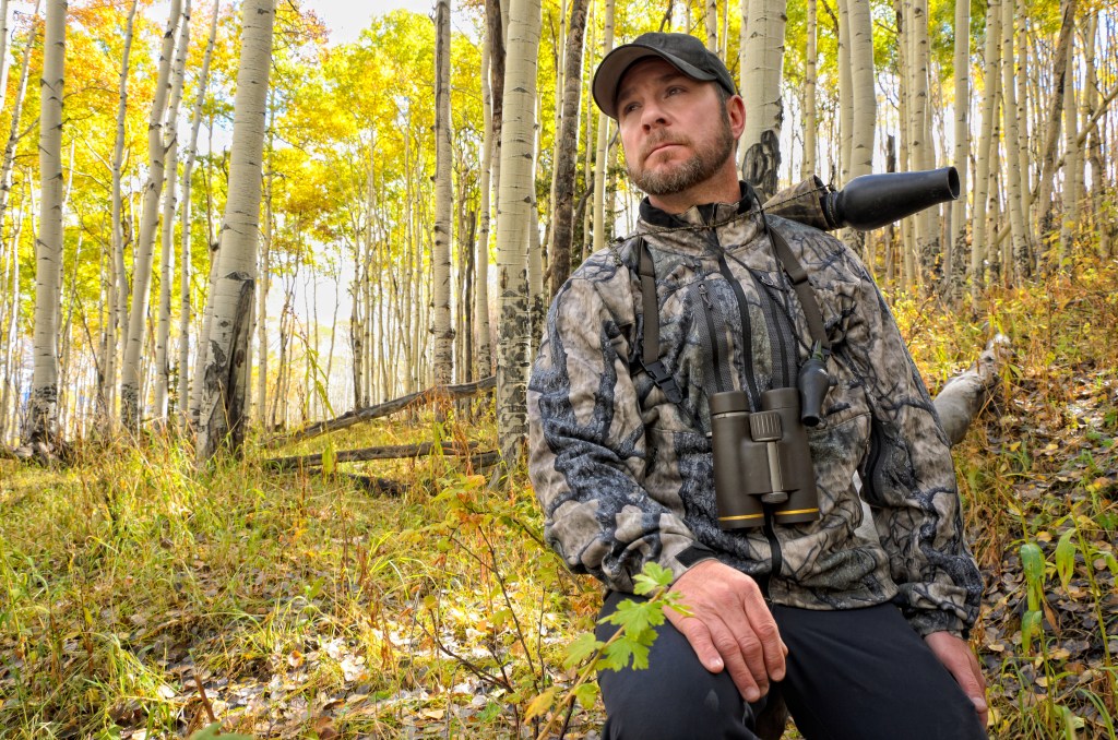 Environmental portrait of man hunting elk in Colorado Rocky Mountains. Captured as a 14-bit Raw file. Edited in 16-bit ProPhoto RGB color space.