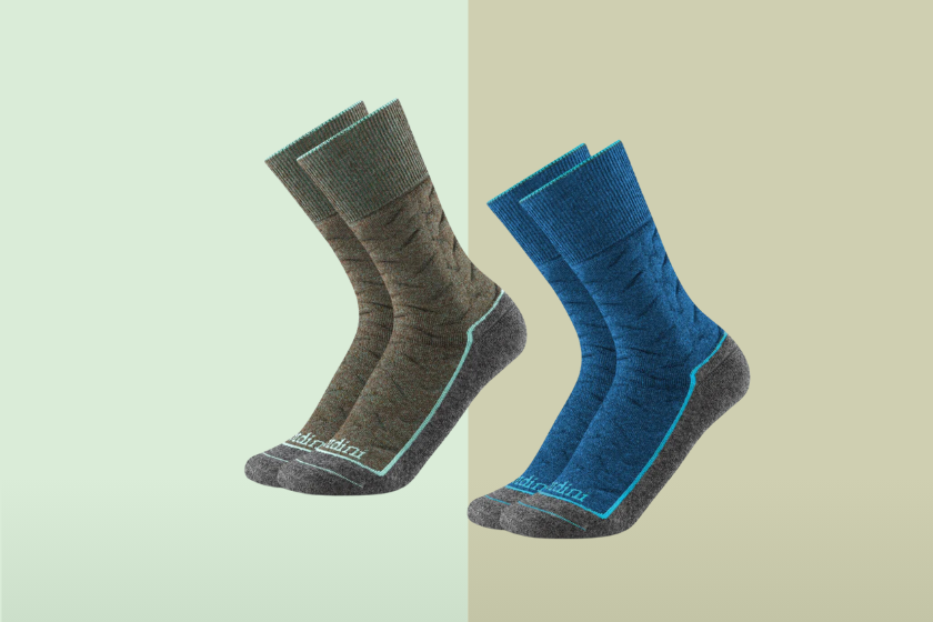 Two pairs of Gordini socks on a green background