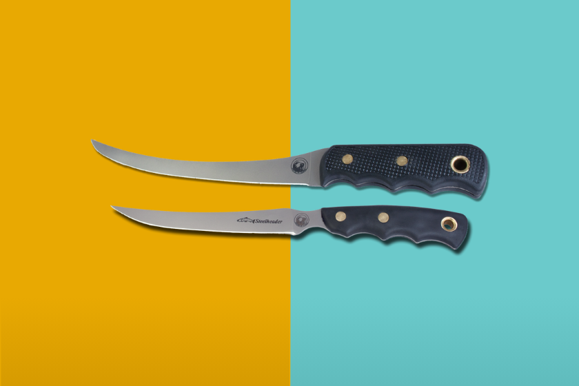 Two knives placed on a blue and yellow background