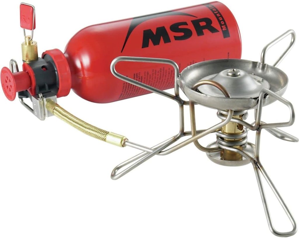 Red and silver MSR Whisperlite camp stove