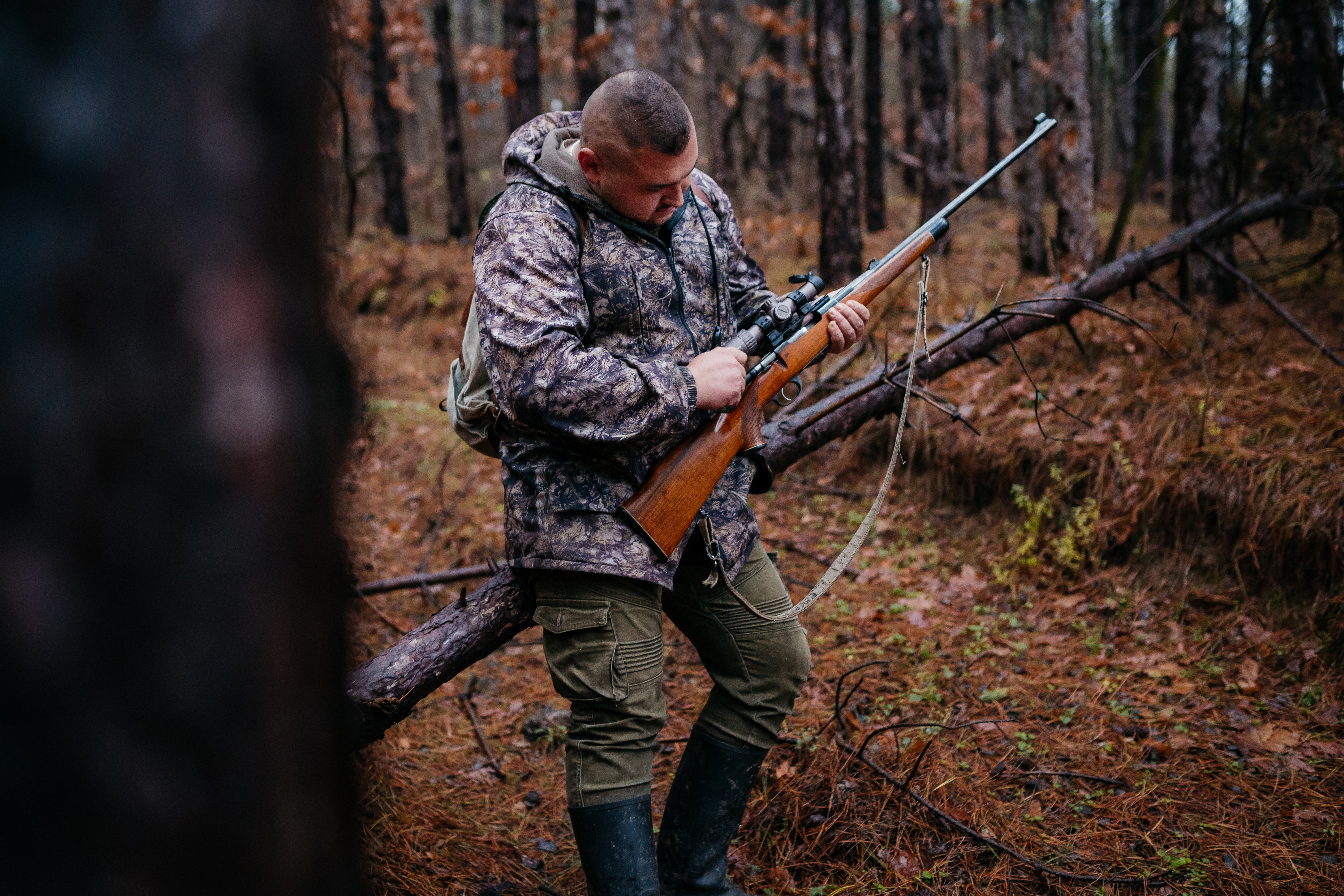 Hunter prepares his deer rifle