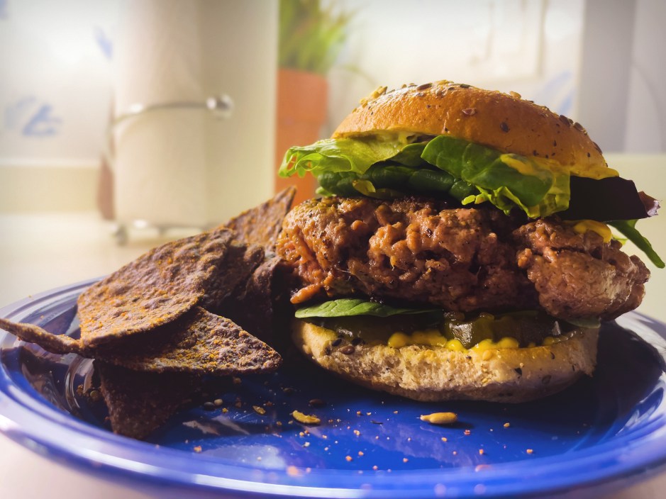 Burgers with Venison Patties Fried on Stovetop and Oven Baked Cooking Lettuce, Tomatoes, Spinach and Organic Whole Grain Bun - smartphone 12mp images shot with focal distance and composition variations (photos professionally retouched)