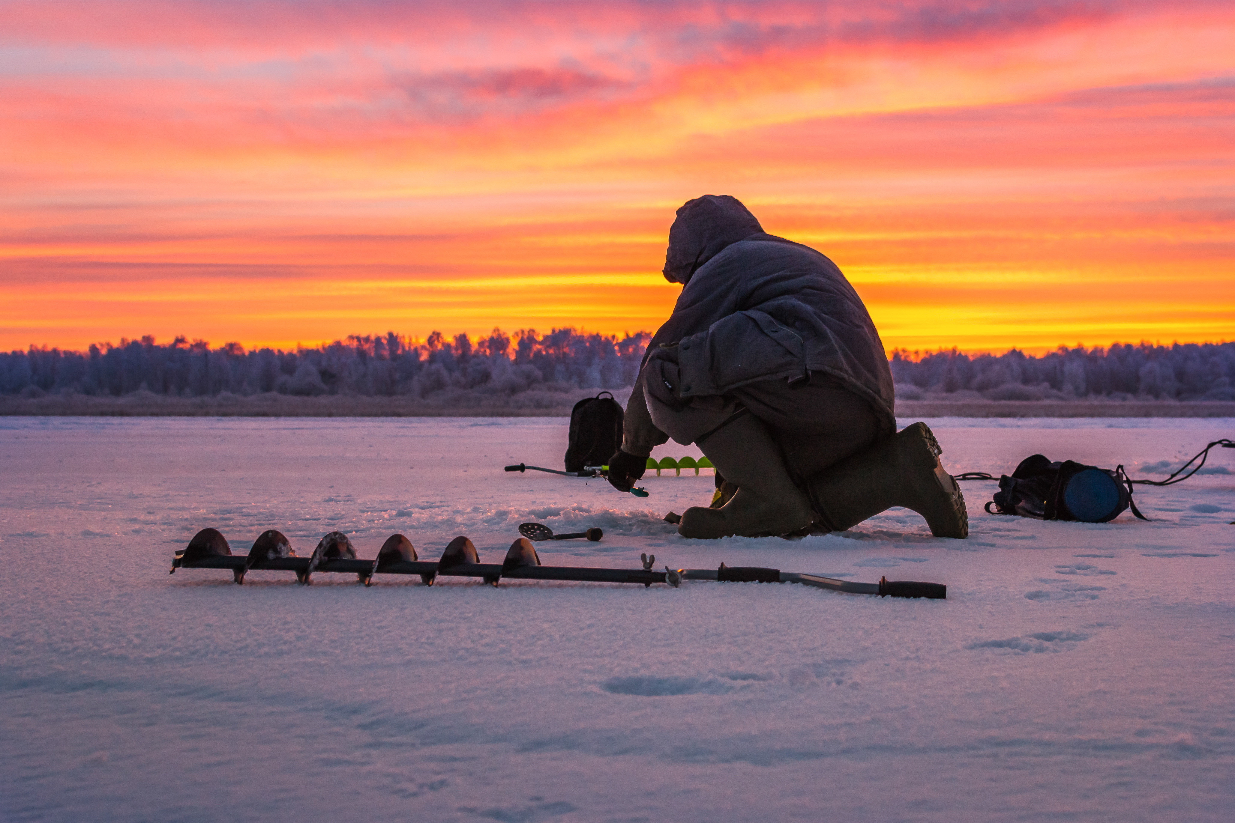 winter sport, winter fishing fishing outside on the ice