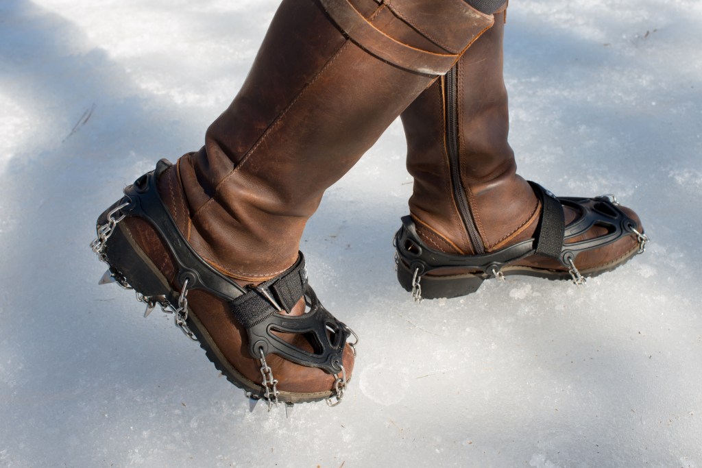 In early spring, roads and trails in rural areas of Canada are often covered by thick ice. Steel traction cleats help to prevent injuries caused by falling.