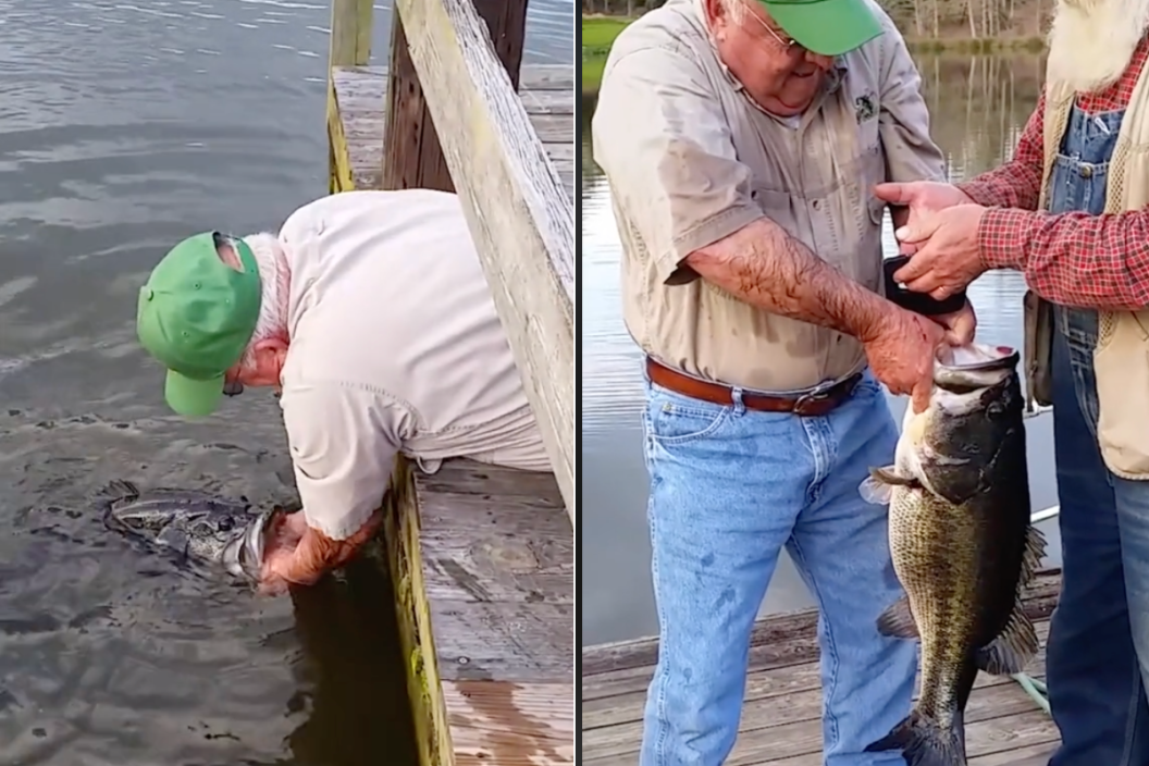Man weighs fish he caught with small fish and hand