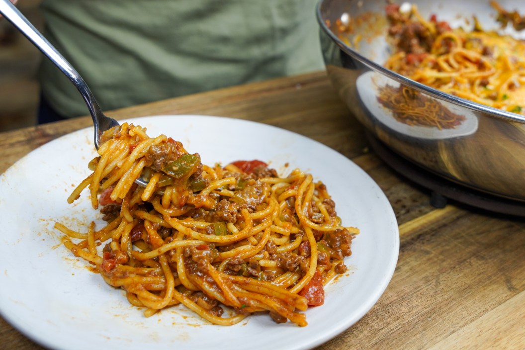 Spaghetti and ground venison mix into a tasty one skillet pasta dish.