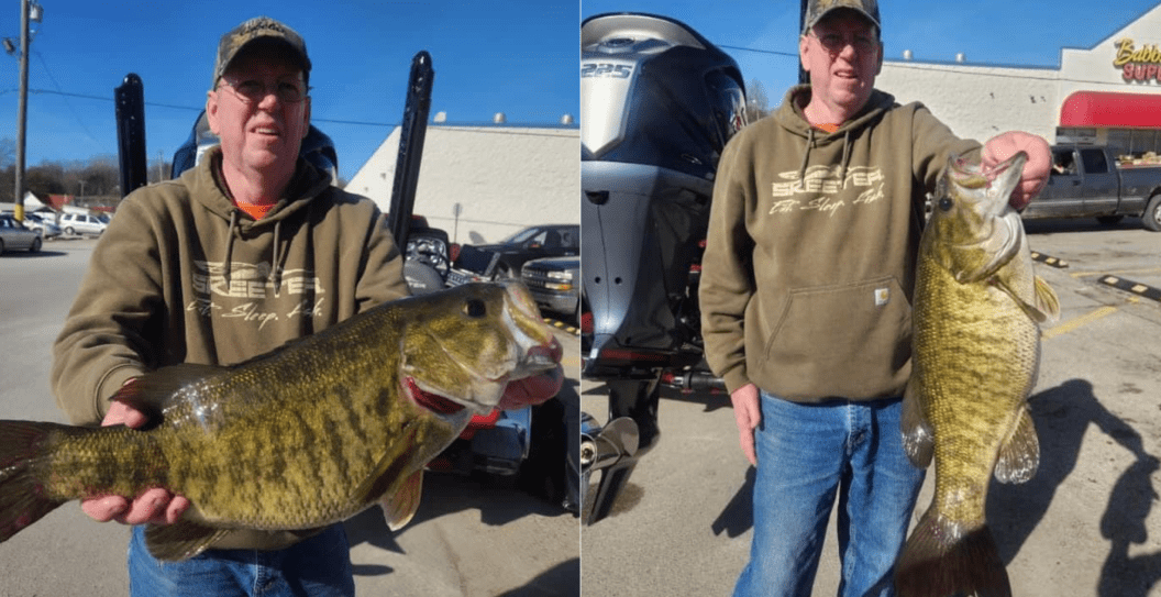 Rex Remington holds up Indiana state record setting smallmouth bass.
