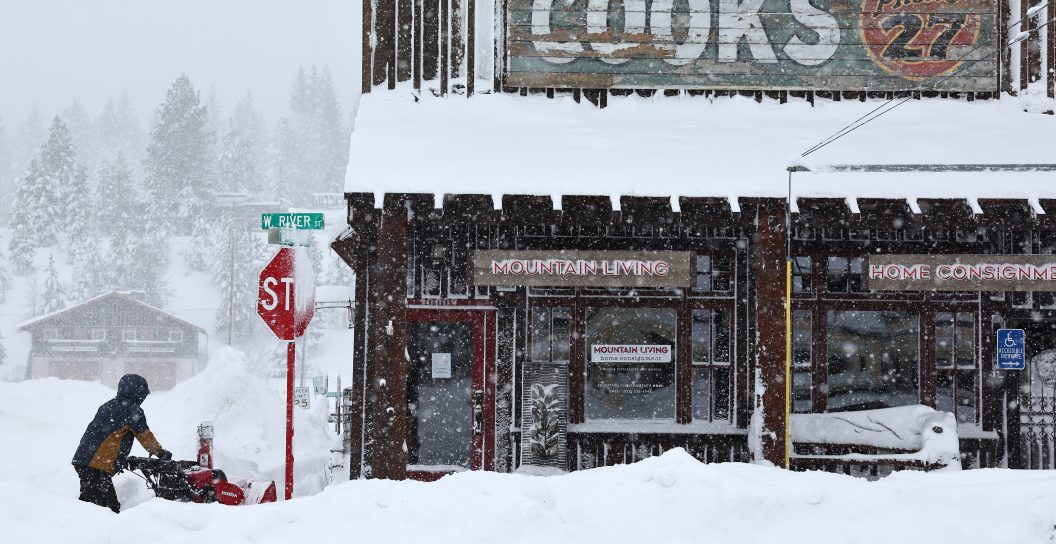 TRUCKEE, CALIFORNIA - MARCH 02: A worker uses a snowblower in front of a downtown business north of Lake Tahoe during a powerful multiple day winter storm in the Sierra Nevada mountains on March 02, 2024 in Truckee, California. Blizzard warnings were issued with snowfall of up to 12 feet and wind gusts over 100 mph expected in some higher elevation locations. Yosemite National Park is closed and a 50-mile stretch of Interstate 80 was shut down yesterday due to the storm.