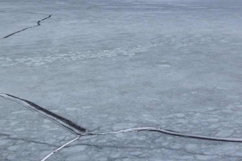 fisherman takes SUV on thin ice