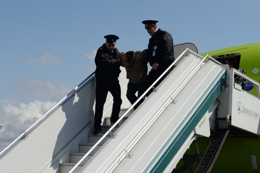 Passenger Tries To Open Plane Door During Flight