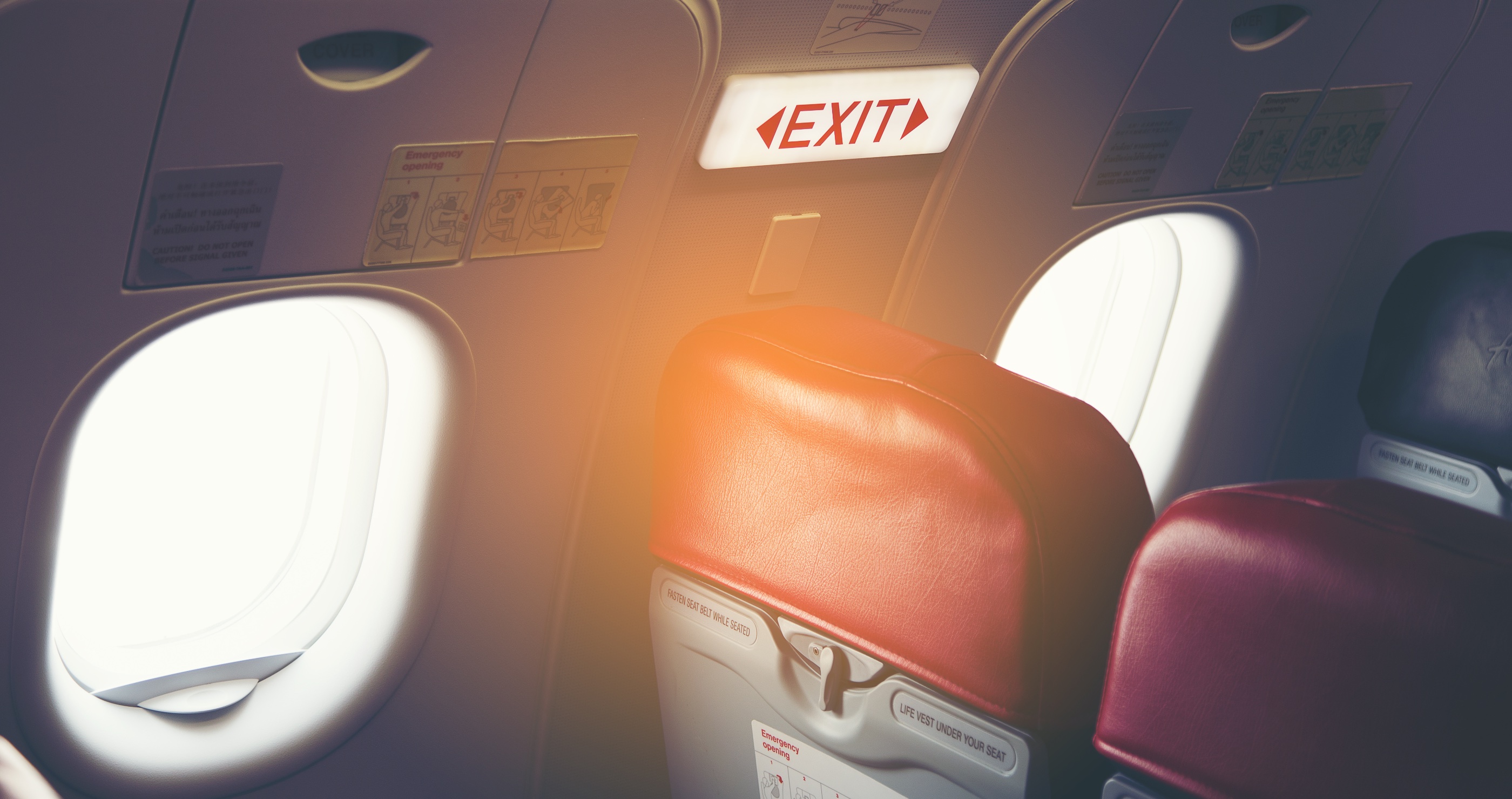 Passenger Tries To Open Plane Door During Flight