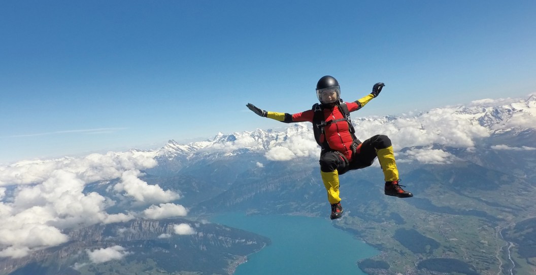 Scary Moment A Skydiver's Parachute Gets Caught On Plane's Tail